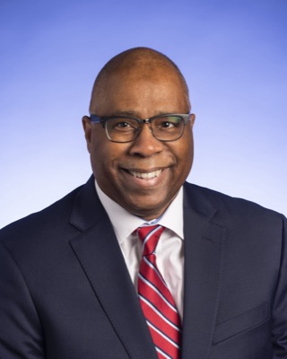 Commissioner Clarence Carter